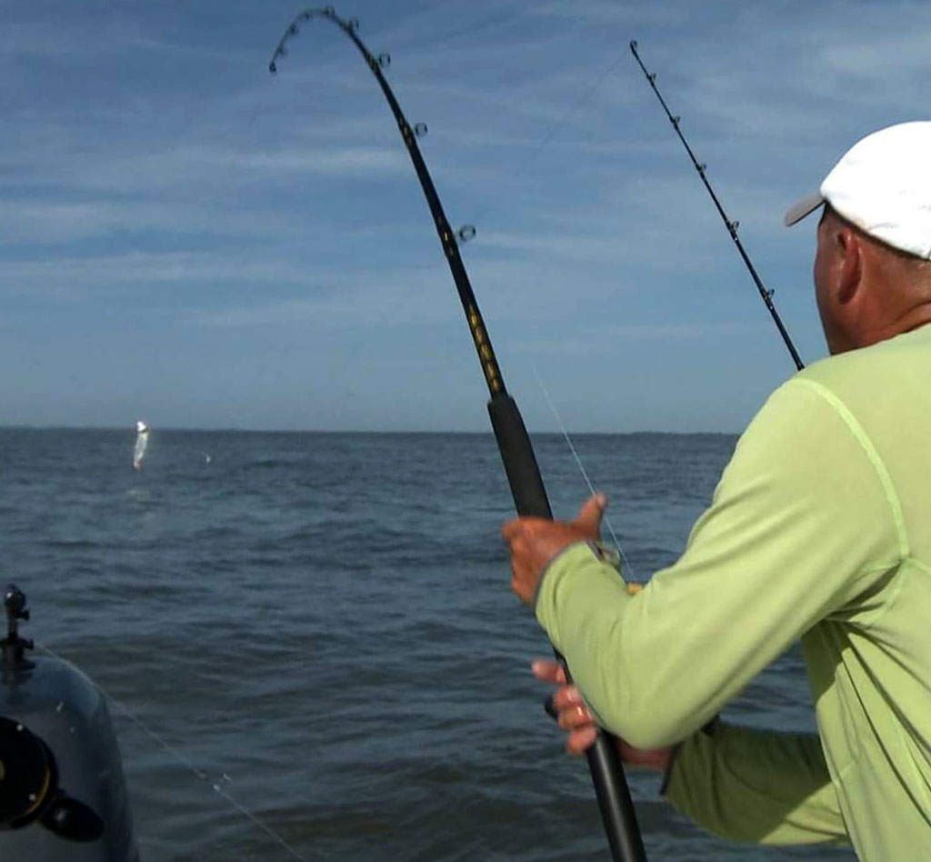 Anglers fighting fish with bent rods in Coastal Georgia